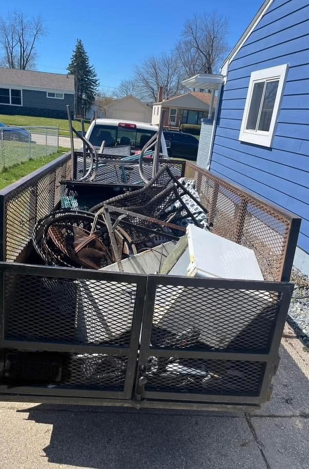 Trailer loaded with junk and scrap items ready for haul-off